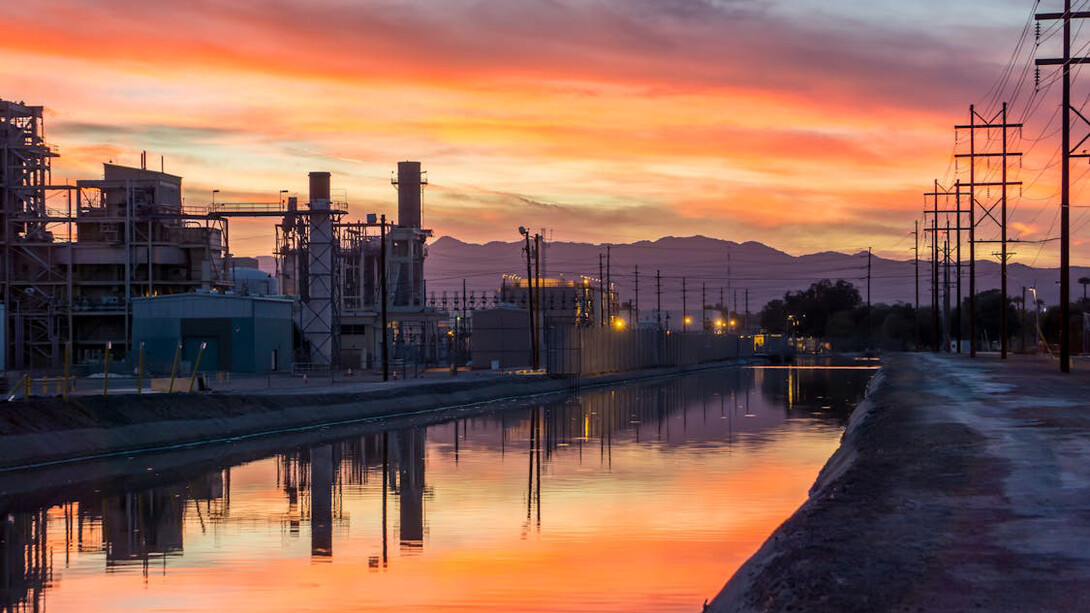 The serene sunset contrasts sharply with the burgeoning data centre expansion in Queretaro, reflecting the tension between economic growth and the pressing need for water conservation