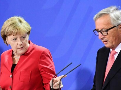 Juncker y Merkel