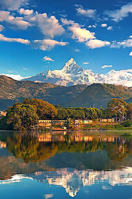 Annapurna mountain range reflected in Phew Lake at Pokhara, Nepal