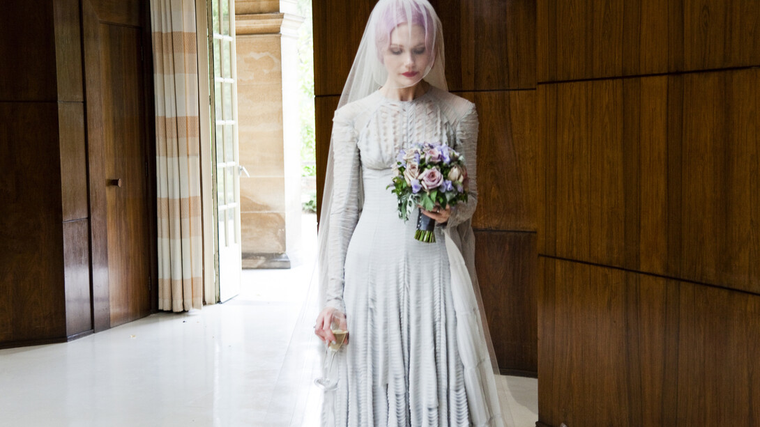 Pale grey slashed chiffon wedding dress  designed by Gareth Pugh and veil by Stephen Jones, 2011. Courtesy of Katie Shillingford. Photo © Amy Gwatkin