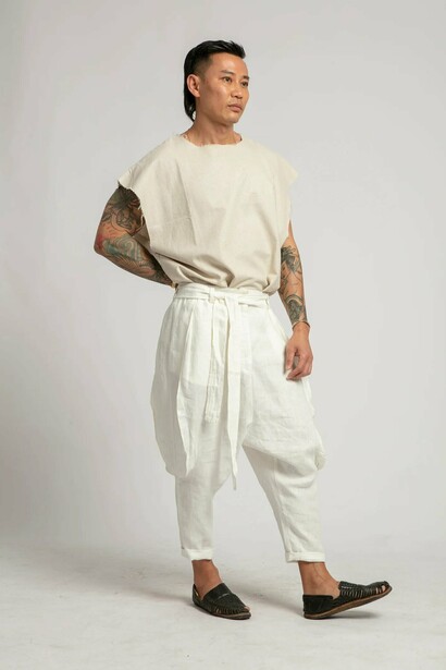 Hero H. Dinh wearing a white top and trousers, Istanbul, Turkey 
