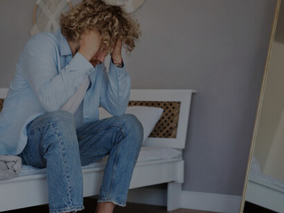 A man grappling with anxiety, stress, and depression, underscoring the significance of mental health awareness and support in navigating life's challenges