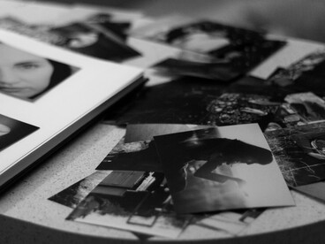 Black-and-white photographs documenting scenes from an earlier era, representing the lives, places and moments preserved even when the time passes