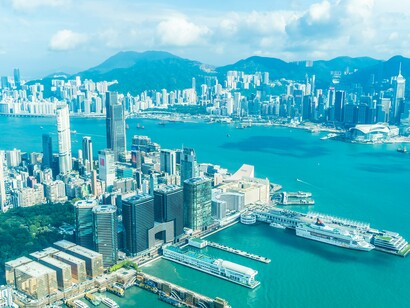 Victoria Harbour in Hong Kong, representing the meeting point of sea, skyscrapers, and global movement