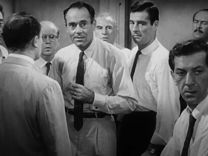 In 12 Angry Men, E.G. Marshall’s Juror 4 represents logic and composure, contrasting with the emotional arguments of other jurors