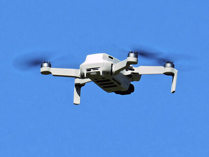 A DJI Mavic Mini drone at High Beach Cricket Club, Pepper Alley, High Beach (also spelled High Beech), Essex, England