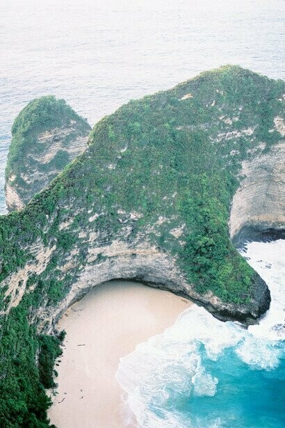 An aerial view of Kelingking cliff, Nusa Penida and its famous dinosaur shape headland