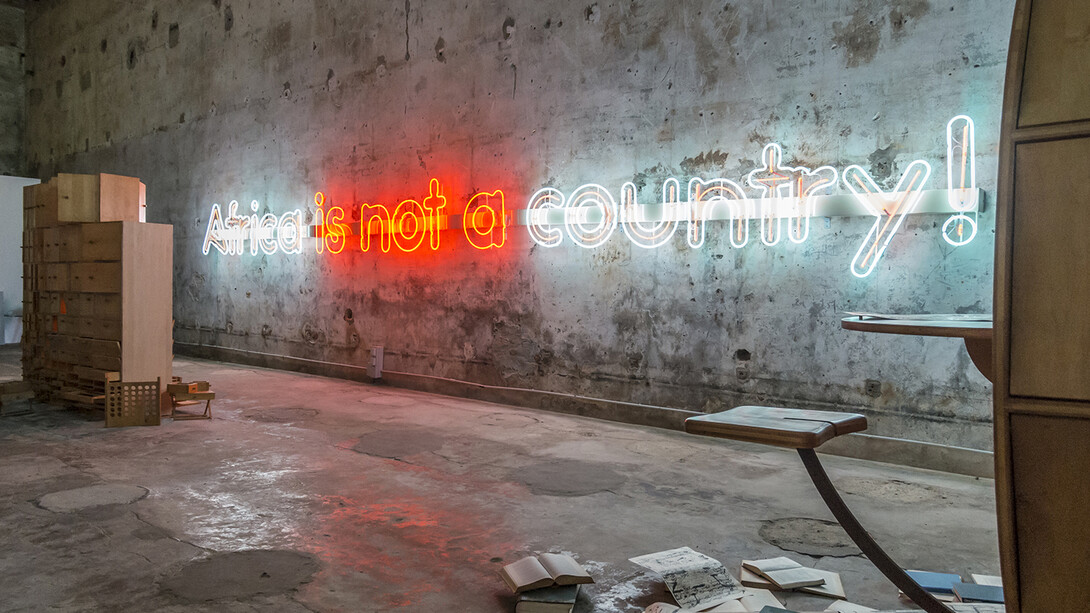 'Diminished Capacity', Padiglione Nigeria, Biennale di Architettura di Venezia 2016. Ola Dele Kuku, 'Africa is not a country', neon installation, photo Filippo Peretti