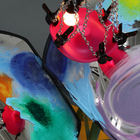 Jessica Stockholder, Gross National Growth (detail), 2014, drive way mirrors, oil paint, acrylic paint, wooden stools, silicone mold, light fixture and cord, clamps, basket ball hoop, pie pan rim, chain and hardware, snap together driveway tiles, black rubber tiles, carpet, plastic parts, copper foil, Hauteur variable (240 cm minimum) x 226 x 160 cm, Courtesy of the artist and Galerie Nathalie Obadia, Paris/Bruxelles