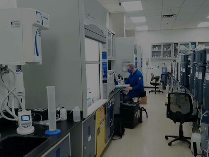 A lab technician performing water filtration tests is a practical application for water