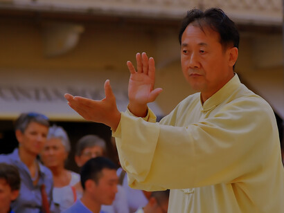 A Qigong practitioner of Chinese descent harnessing holistic wellness