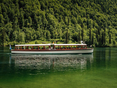 A picturesque landscape beautifully reflected in a calm lake, highlighting the splendor of nature