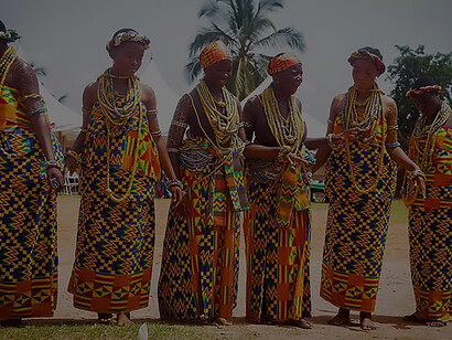 In the midst of a Ghanaian festival, the radiant presence of these Krobo girls, draped in the splendor of Kente, adds a kaleidoscopic brilliance to the cultural panorama
