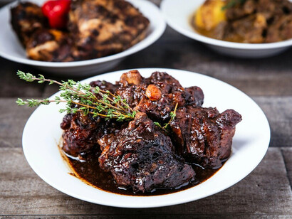 Oxtail presented as a luxury dining experience, symbolising how scarcity can be socially constructed rather than naturally occurring