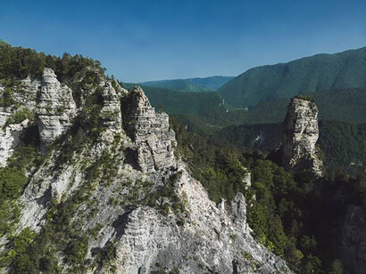 Aerial view of the rock massifs and Sairme pillars at sunset in the Caucasus region of Georgia