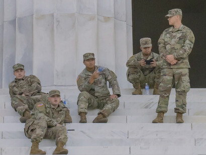 Five US Military soldiers on the steps of Washington DC, USA