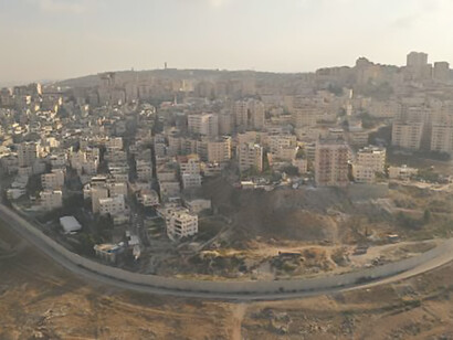 Explore the aerial division between Israel and Palestine with a focus on the Security Wall, showcasing the Gaza Strip