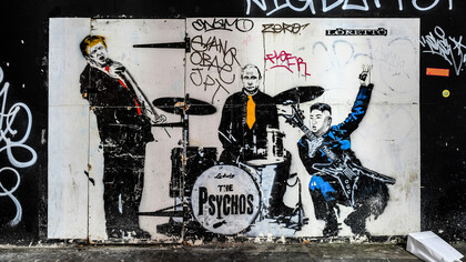 Grafiti en el exterior de un bar de la ciudad de Rosario, Argentina 