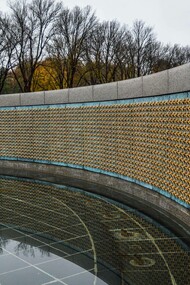Side view of the National World War Two Memorial Wall in Washington, DC, adorned with 4,048 gold stars; each represents 100 Americans who died during the Second World War