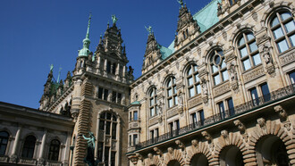 The iconic city hall in Hamburg, Germany, a vast Neo-Renaissance building built in 1897, a testament to cultural integration and the power of diverse perspectives