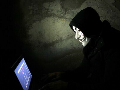 Anonymous member with a laptop
