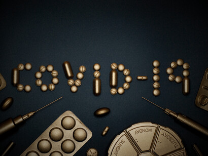 COVID-19 spelt from healthcare supplies, representing the fear, confusion, and reliance on medical systems