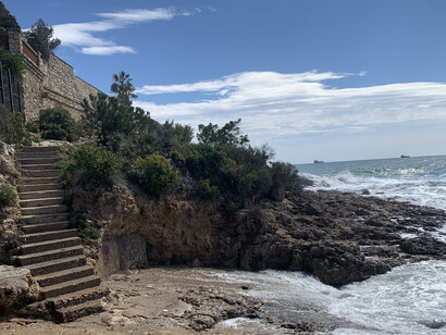 Ancient rock stairs allow for secluded beach access