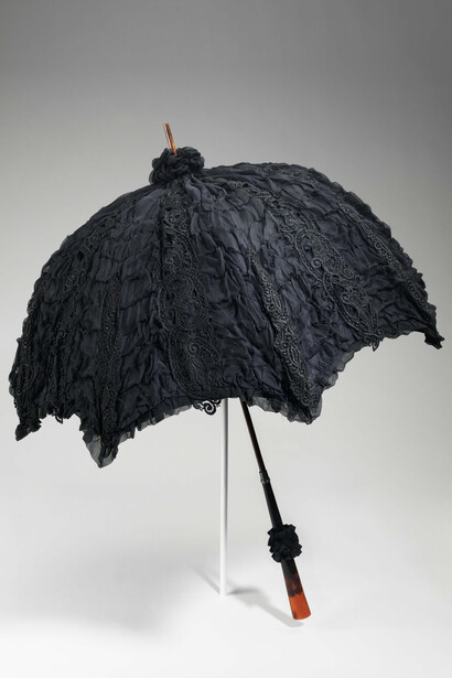 Mourning Parasol, 1895-1900, Black silk, wood, metal, tortoiseshell. The Metropolitan Museum of Art, Brooklyn Museum Costume Collection at The Metropolitan Museum of Art, Gift of the Brooklyn Museum, 2009; Gift of Rachel Trowbridge, 1960 (2009.300.2478). Photo: © The Metropolitan Museum of Art