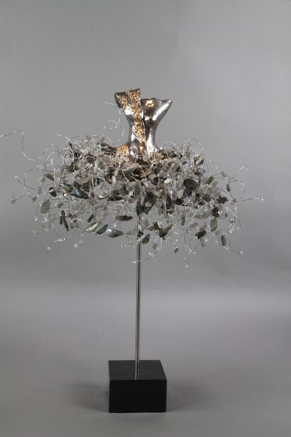 Estella Fransbergen, 2021,
Clay white Gold over glaze torso with yellow gold texture one shoulder shorti style, Laborite, Swarovski crystals,
28 x 21 x 21 in