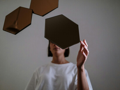As her mind drifts, she contemplates the delicate balance between self-awareness and true introspection, a theme at the heart of modern storytelling