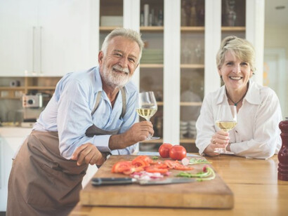 A couple enjoying a glass of wine, are spending quality time and is a happy life