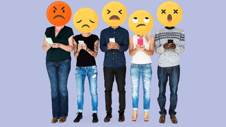 People holding emoji faces while making negative comments on social media, depicting trolling behavior in the online sphere