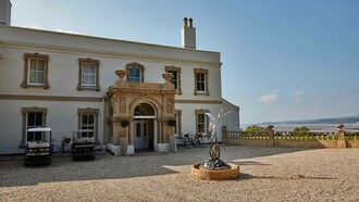 Lympstone Manor in Exmouth, England, is now a five star hotel with a Michelin-starred restaurant
