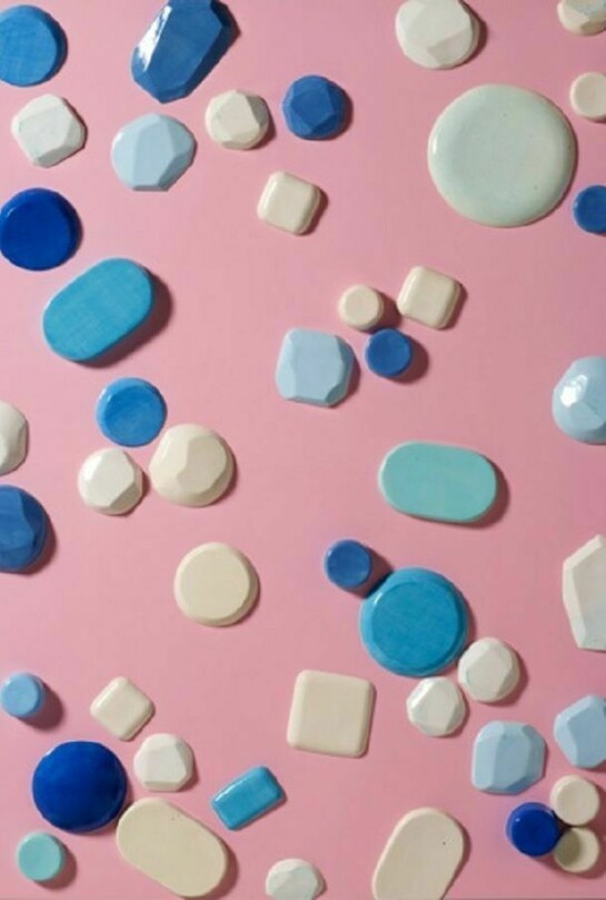 Untitled (pink), 2013. Automotive-finished wood panels with hand-glazed, high-fired ceramics. 60 x 48 inches