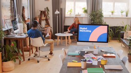 The marketing team collaborates enthusiastically, exploring innovative ways to integrate AI into their strategies for enhanced consumer engagement