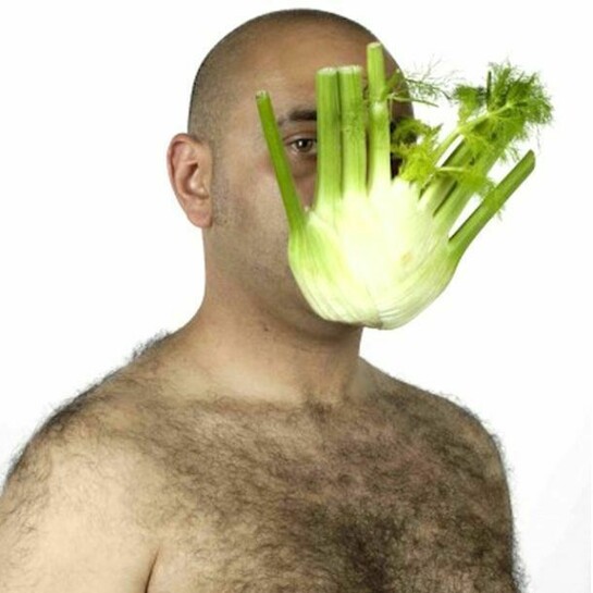 Raed -Self portrait with foreign fruits and vegetables