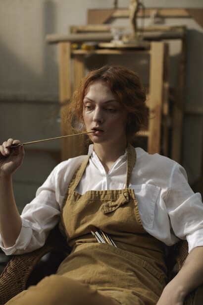 An artist with her paintbrush. Clarity is a very important asset