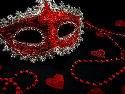The masquerade; the author feels like he is not meant to be connected with the universe because he can never experience the hidden truth behind facades
