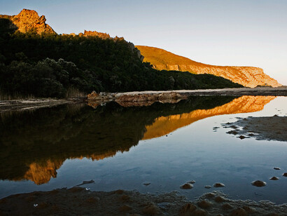 The Grootrivier lagoon in the evening light, Nature’s Valley, photographed by Obie Oberholzer
