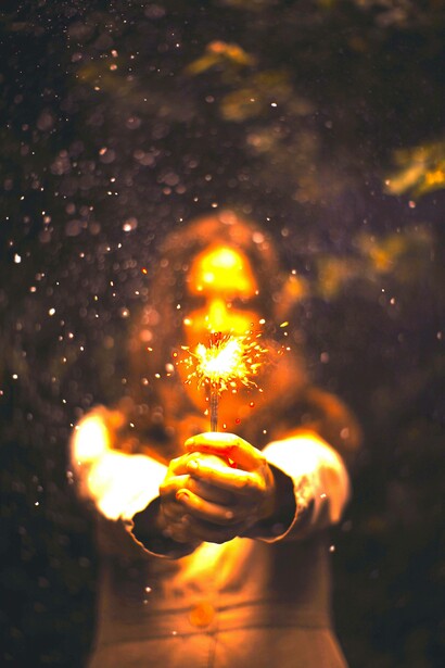 Woman lighting a firework