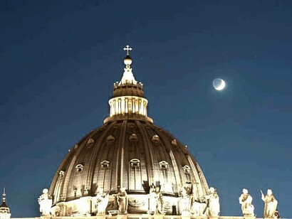 A view of the dome of Saint Peter's Basilica early morning January 2023