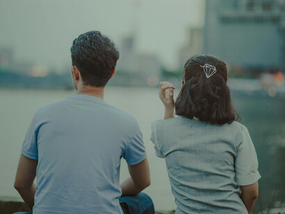 Two people reliving a collection of memories so they can run away from one of life’s hardest truths, that at the end of the day, we are all just passing each other by