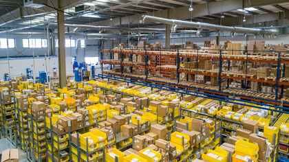 Thousands of boxes inside a warehouse, where the employees organize and manage a magnificent amount of products