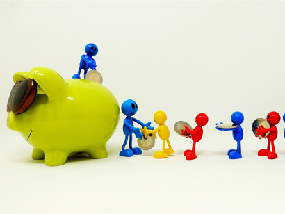 Adding money to the piggy bank