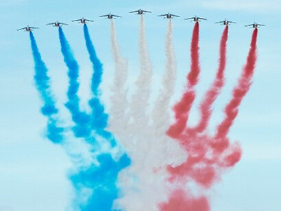 French aircraft fly over the Champs-Elysees during the annual Bastille Day military parade in Paris, July 14, 2017, France
