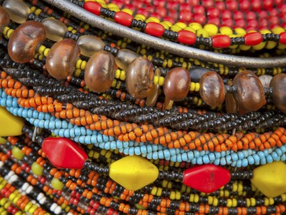 A close-up of richly coloured beads, representing how patterns indicate cultural roots