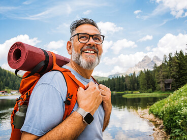 Active senior hiker enjoying a mountain adventure, walking through scenic landscapes and embracing a healthy outdoor lifestyle