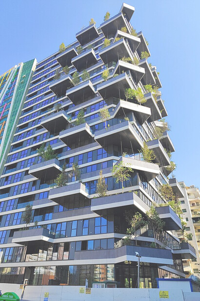 Bosco Verticale (Vertical Forest) in Milan features residential towers adorned with over 20,000 trees and 9,000 plants, creating a vertical forest in the cityscape