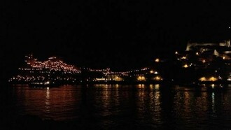 Portovenere and its thousand lights shining at night