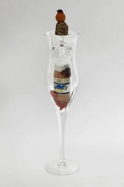 Jack Lavender, As Real As Time 2013, Glass, plastic bird, flesh coloured paint, fake leaves, plastic sausage, glue, 71x15x15 cm, 28x5.9x5.9 ins, AP-LAVEJ-00083